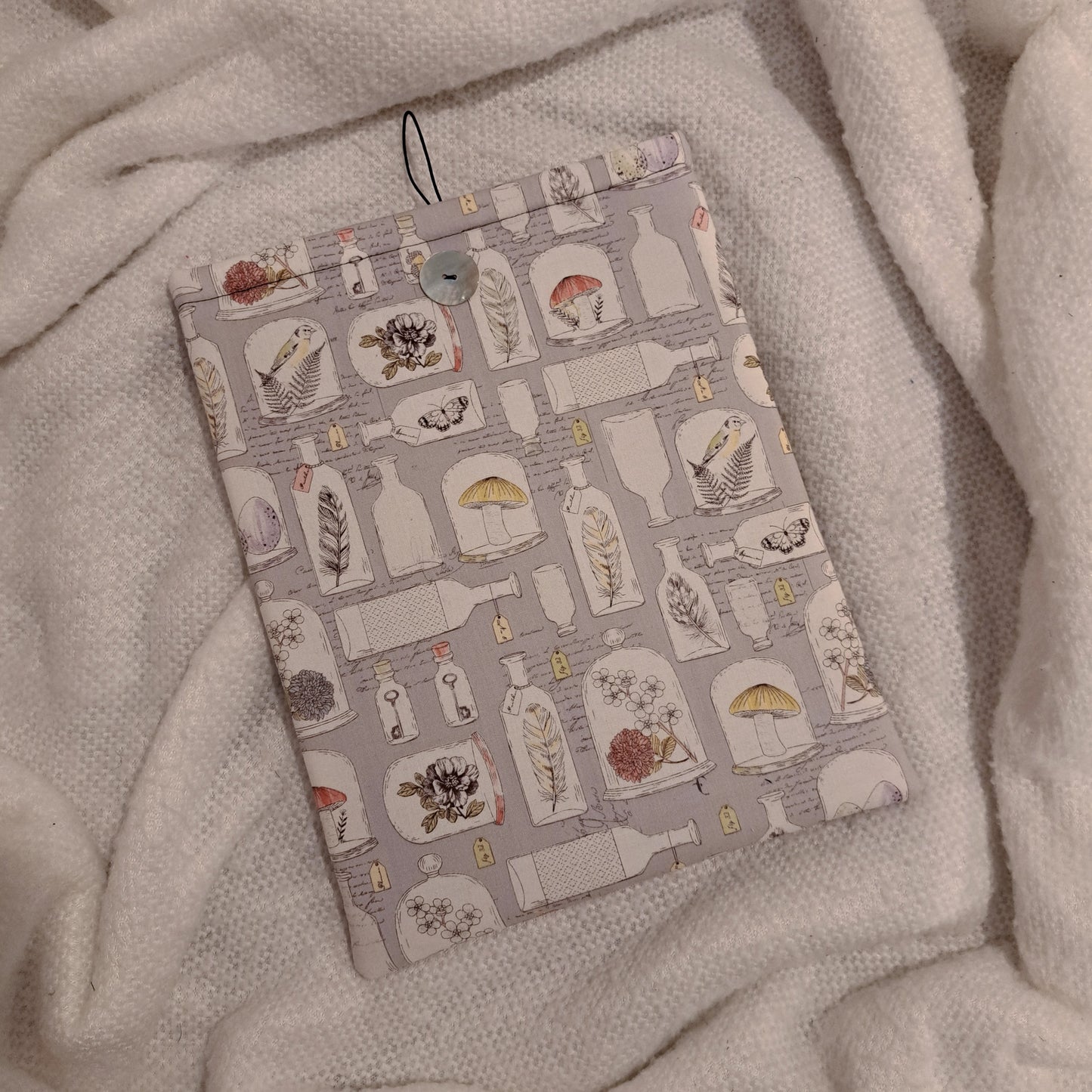 Curio Bottles Booksleeve